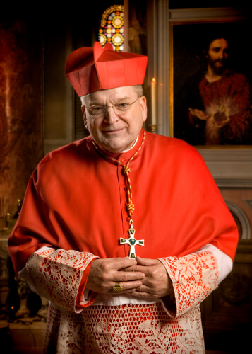 LISA JOHNSTON | lisa@aeternus.com  lisajohnston@archstl.org .His Eminence Raymond Cardinal Leo Burke | Prefect of the Apostolic Signatura | Archbishop Emeritus of St. Louis in front of the shrine to the Sacred Heart of Jesus in the Cathedral Basilica of S