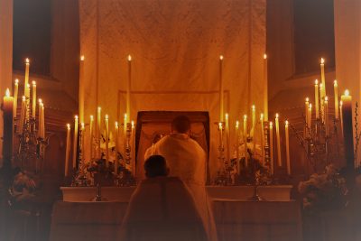 The Blessed Sacrament is placed in the Tabernacle at the Altar of Repose